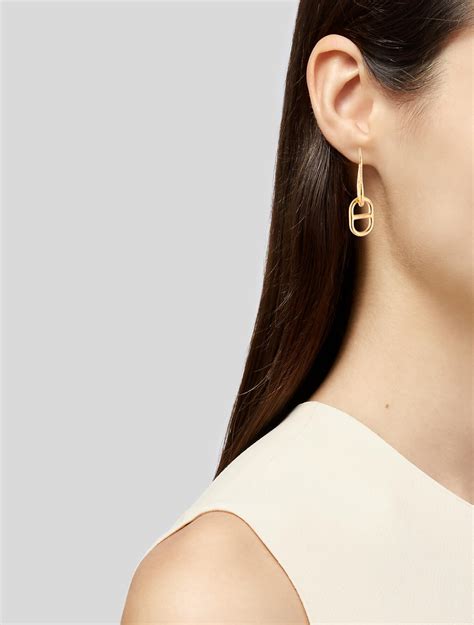 hermes o'maillon earrings|Hermes leather earrings.